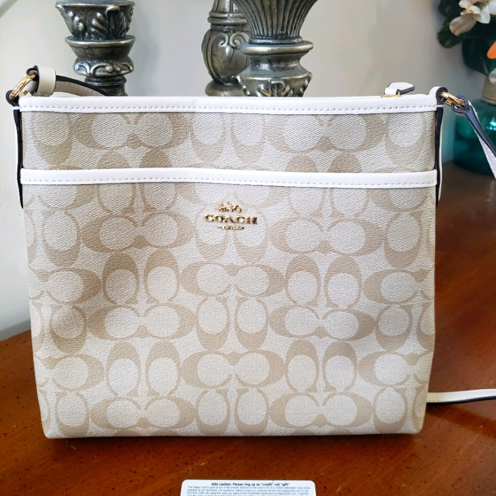 Coach signature monogram file cross body bag